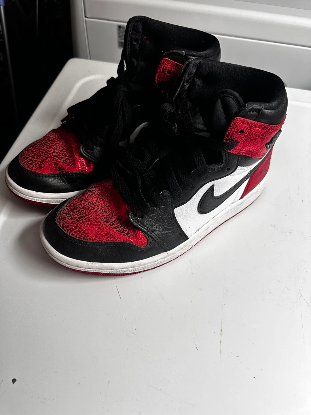 Air Jordan 1 Mid Red Black White Sneakers