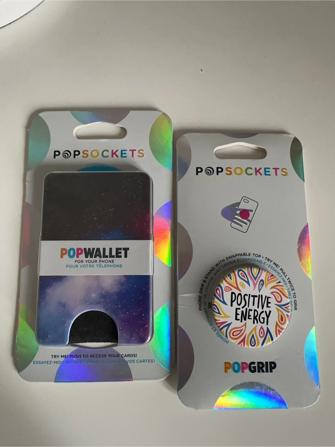 A set of 2 Popsockets PopWallet and PopGrip