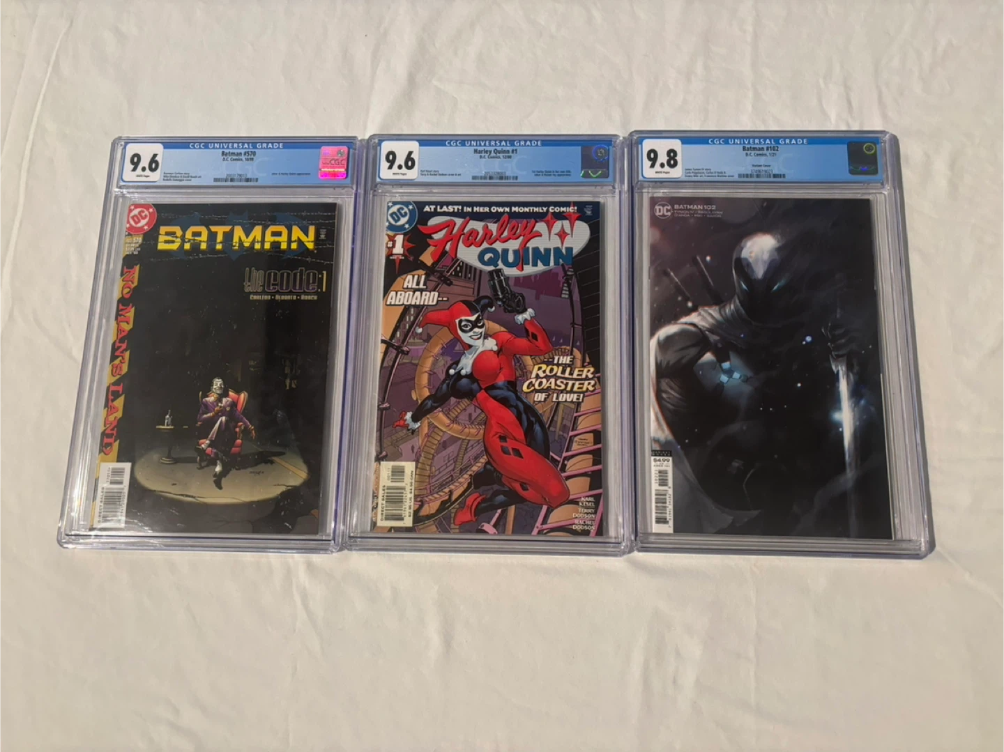 DC Comics Batman, Harley Quinn, and Batman Comic Books
