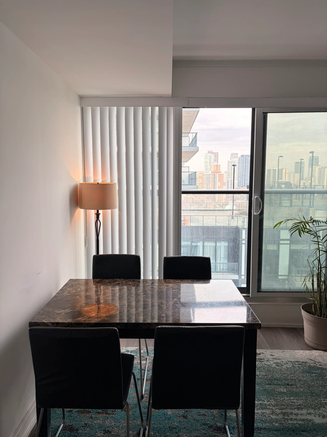 Marble Dining Table with 4 Black Chairs
