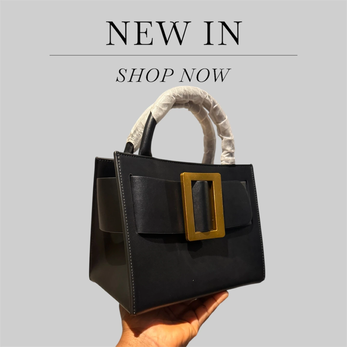 Black Top Handle Bag with Gold Buckle