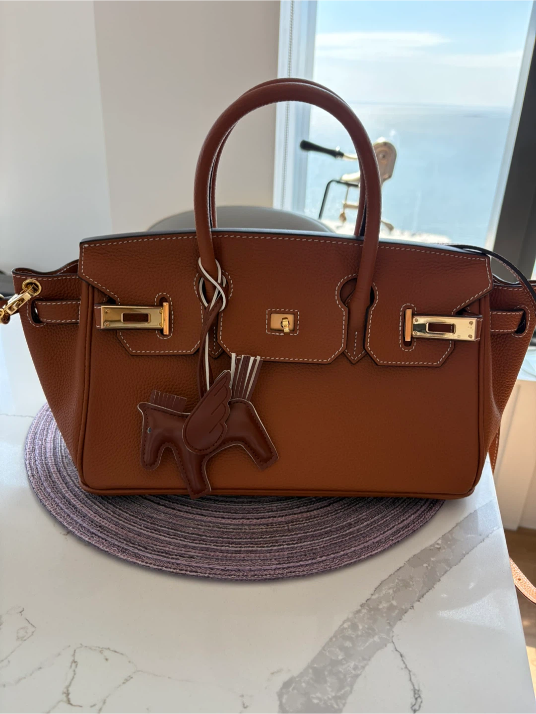 Brown Leather Handbag with Pegasus Charm