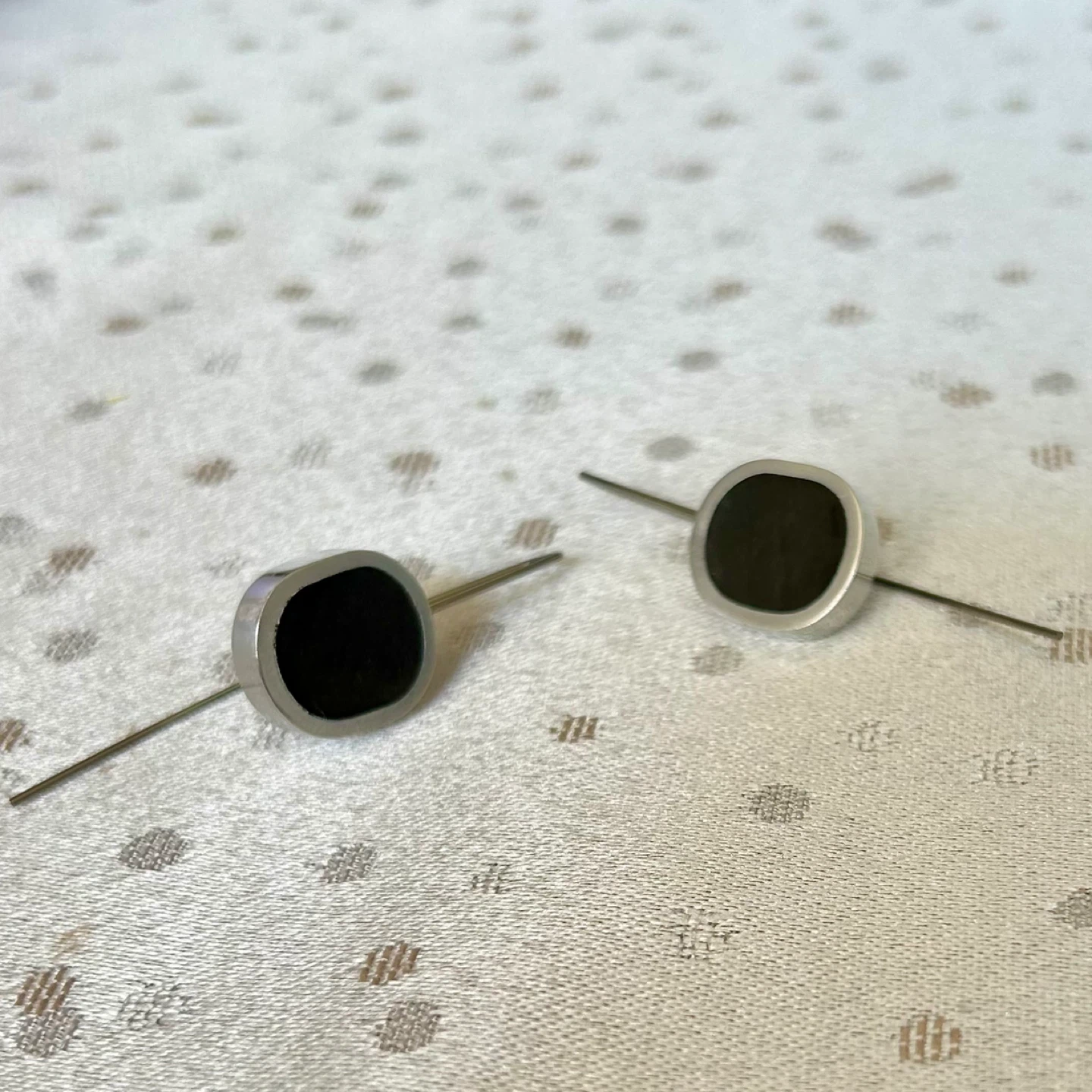 Silver tone earrings with black stones - photo 2