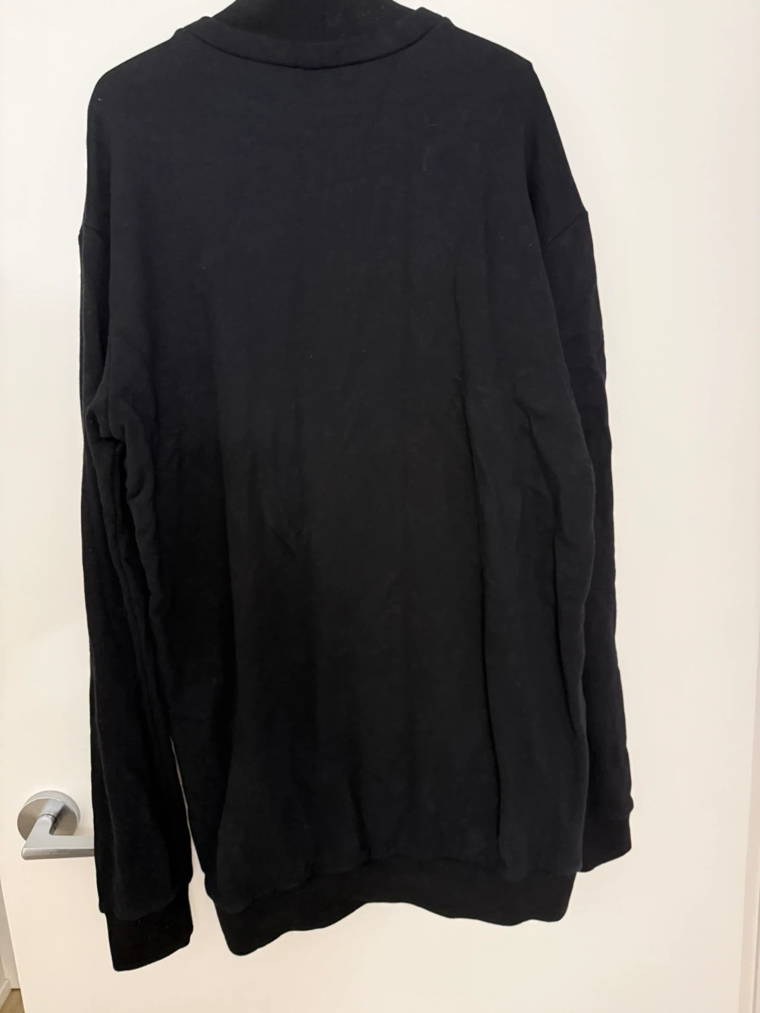 Black streetwear sweatshirt with bold ICON graphic and zip. - photo 2