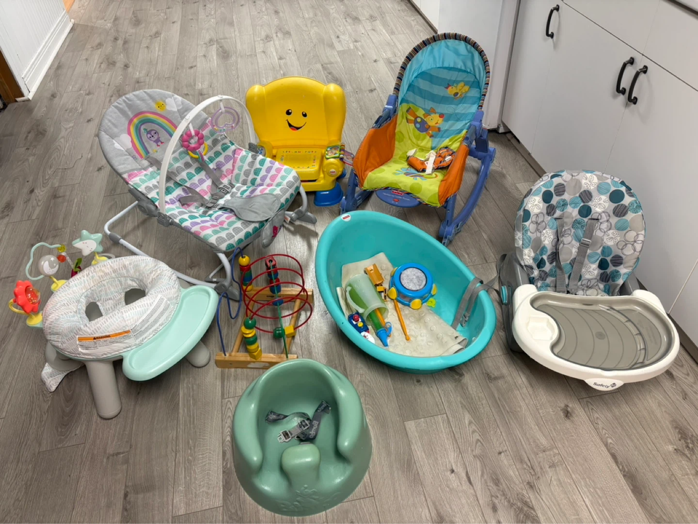 Assorted Baby Gear Lot: Bouncer, High Chair, Bath Tub, and Toys