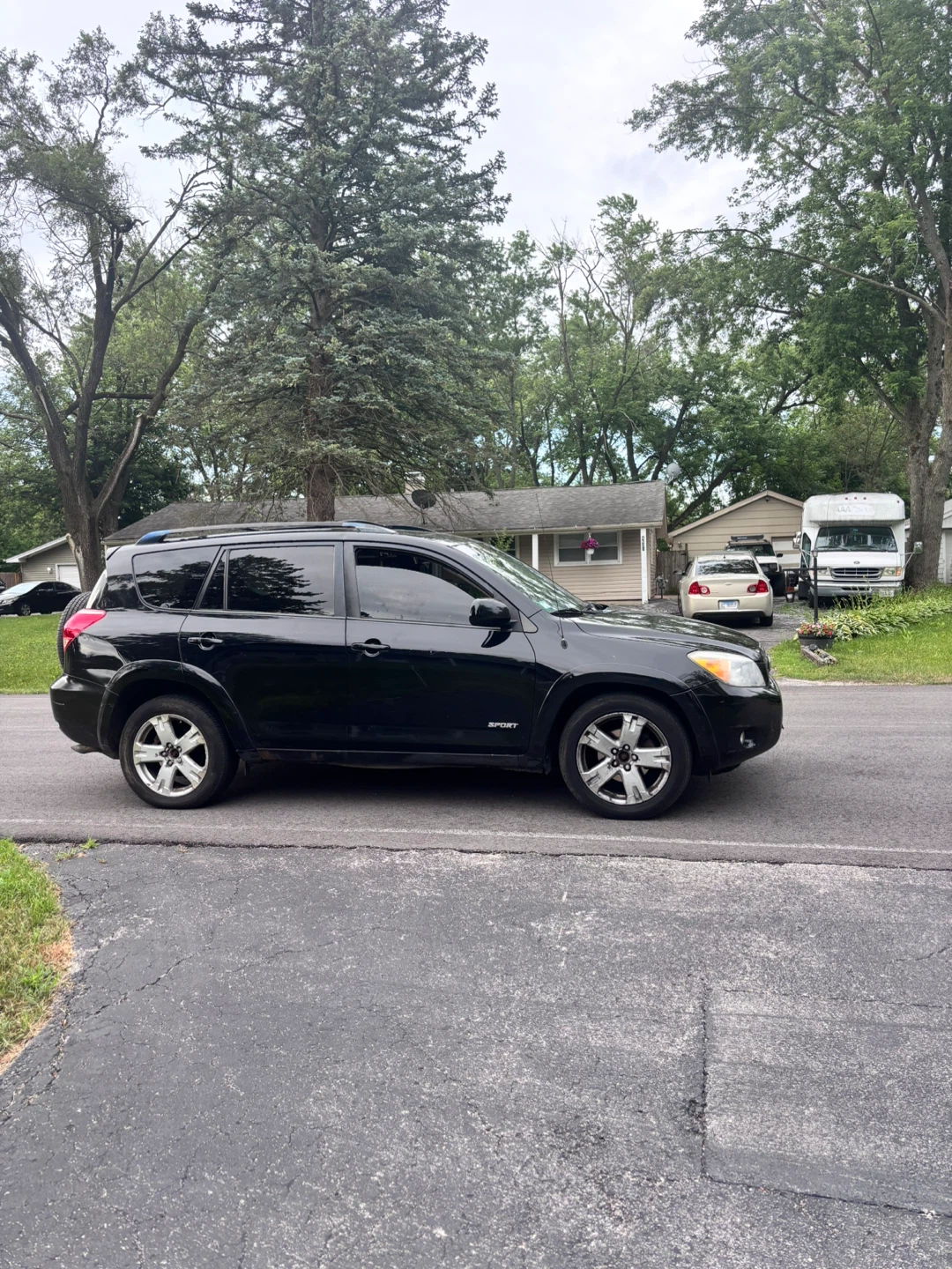Black Toyota RAV4 V6 Sport SUV - photo 3