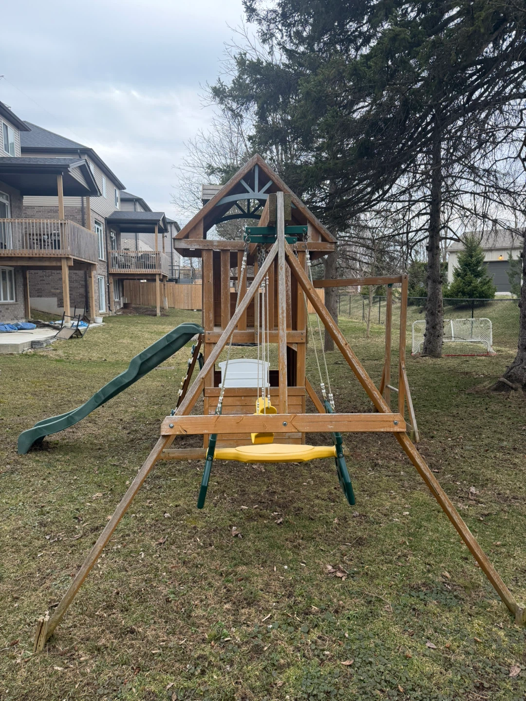 Backyard wooden swingset and playhouse with slide - playground - photo 4
