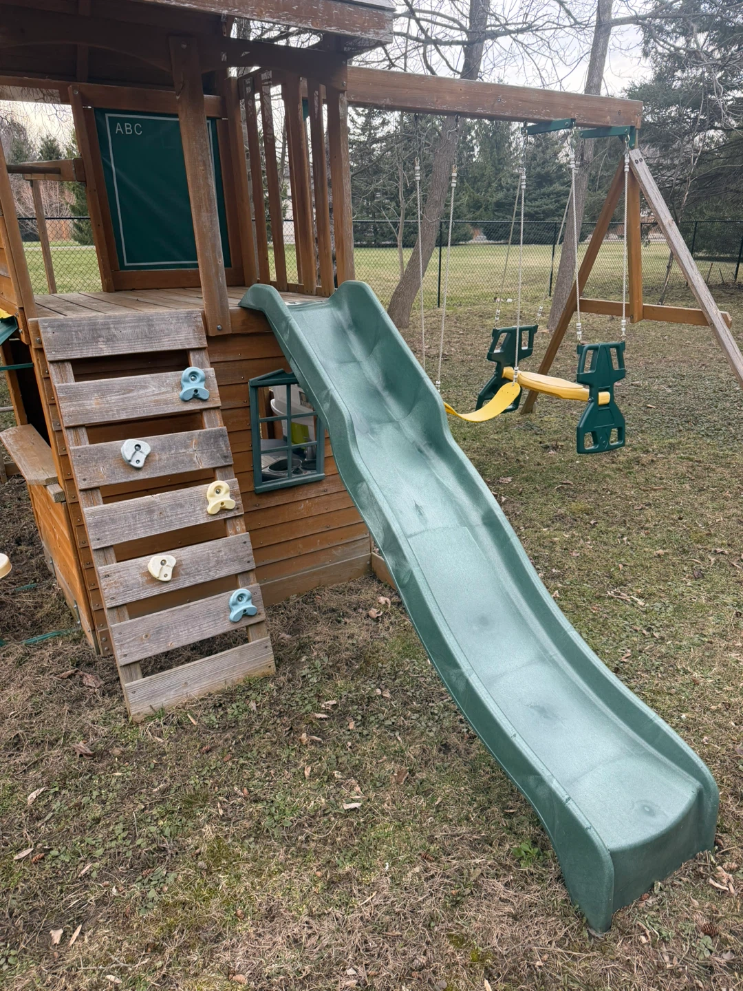 Backyard wooden swingset and playhouse with slide - playground