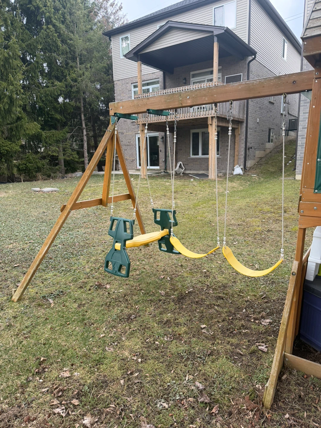 Backyard wooden swingset and playhouse with slide - playground - photo 3