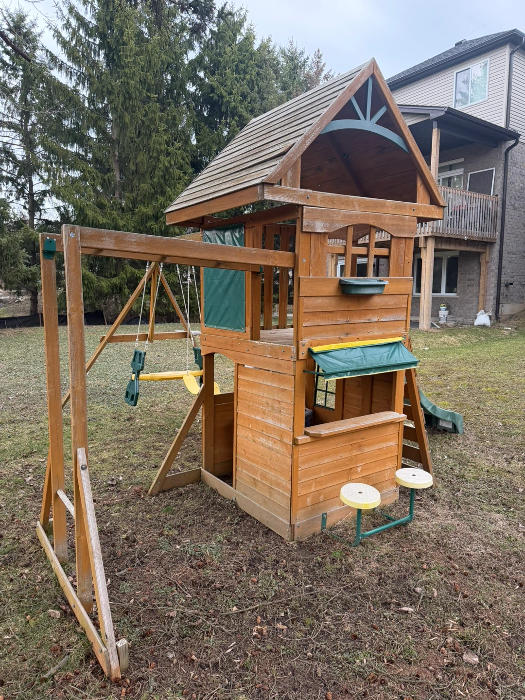 Backyard wooden swingset and playhouse with slide - playground - photo 2