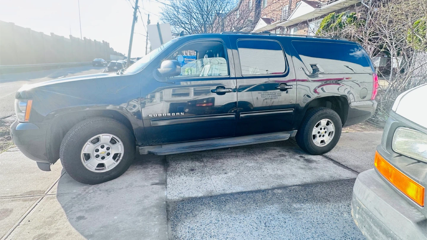 Black Chevrolet Suburban SUV - photo 2