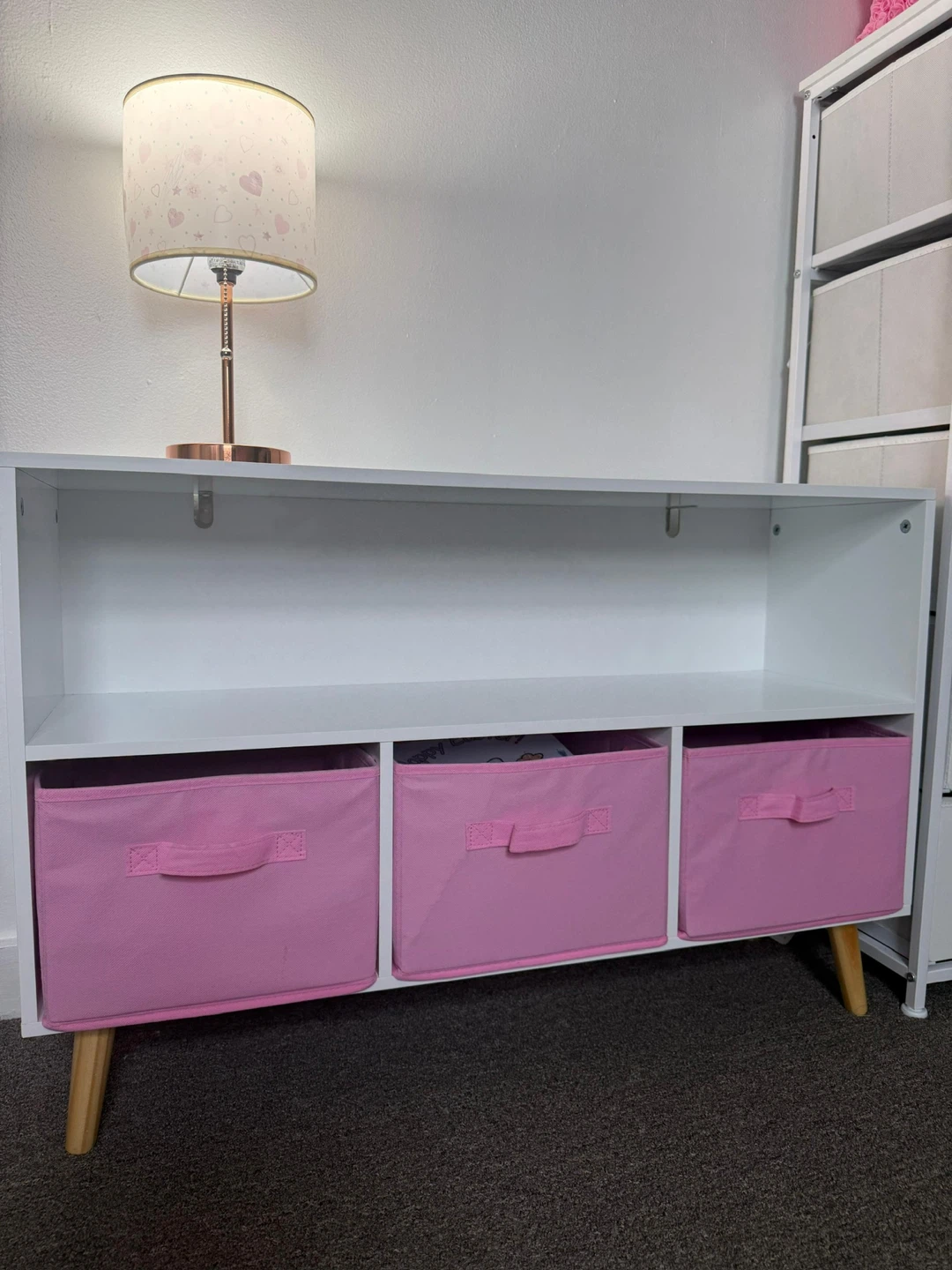 White Storage Unit with 3 Pink Fabric Bins