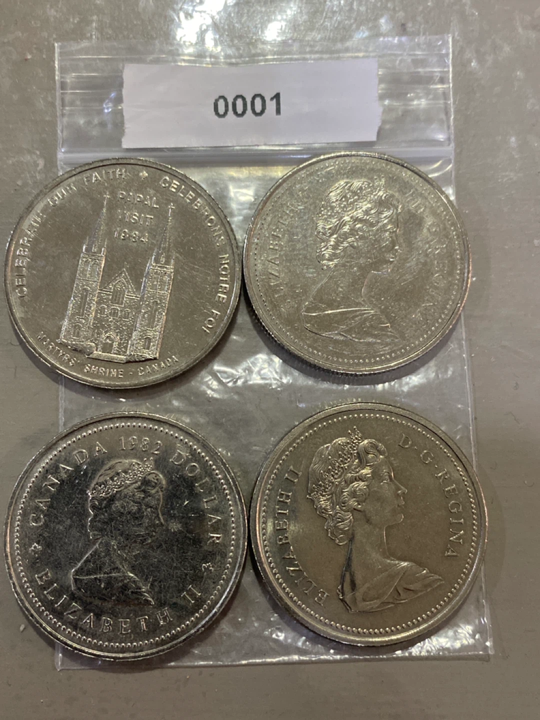 Collection of Four Canadian Dollar Coins - photo 3