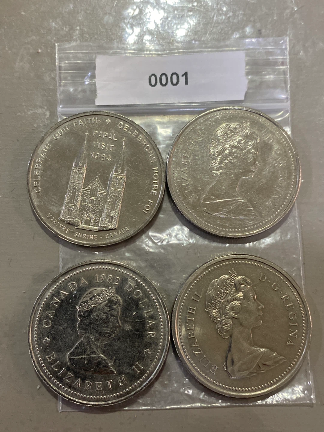 Collection of Four Canadian Dollar Coins - photo 4