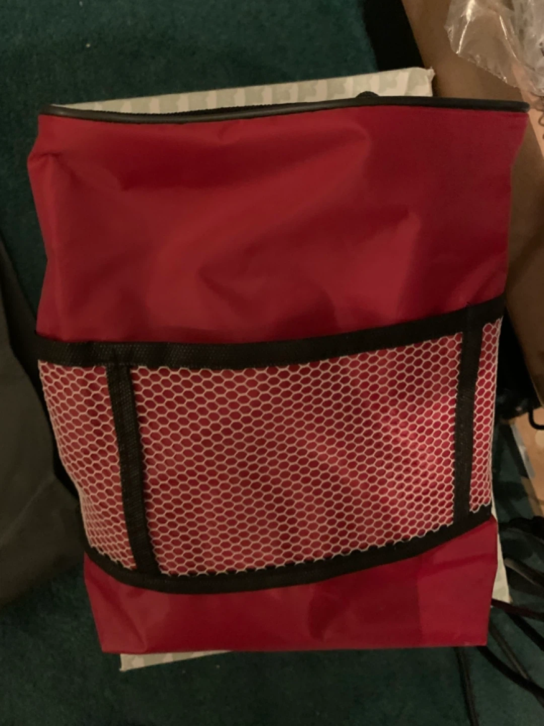 Red insulated tote bag with mesh pocket
