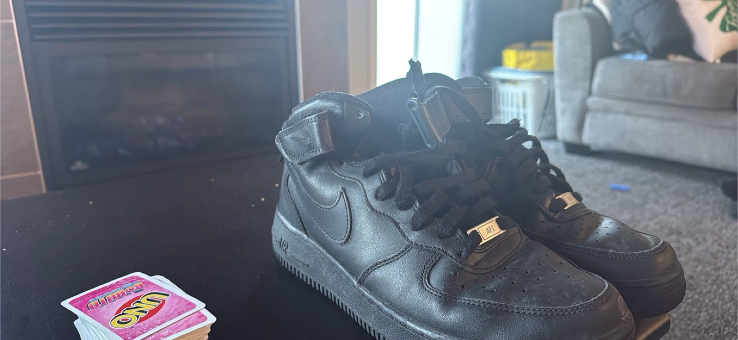 Nike Air Force 1 Mid Black Leather High-Top Sneakers