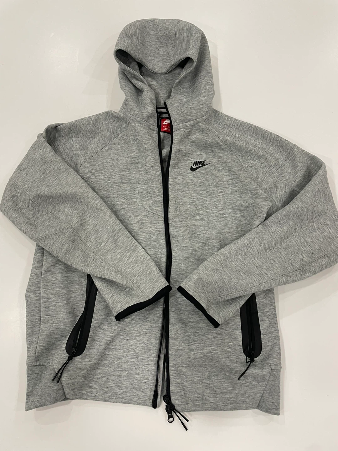 Grey Nike tech jacket