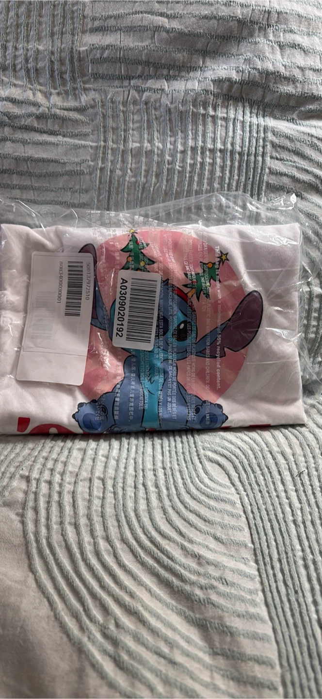Women size small tags still on Disney Stitch Christmas T-Shirt