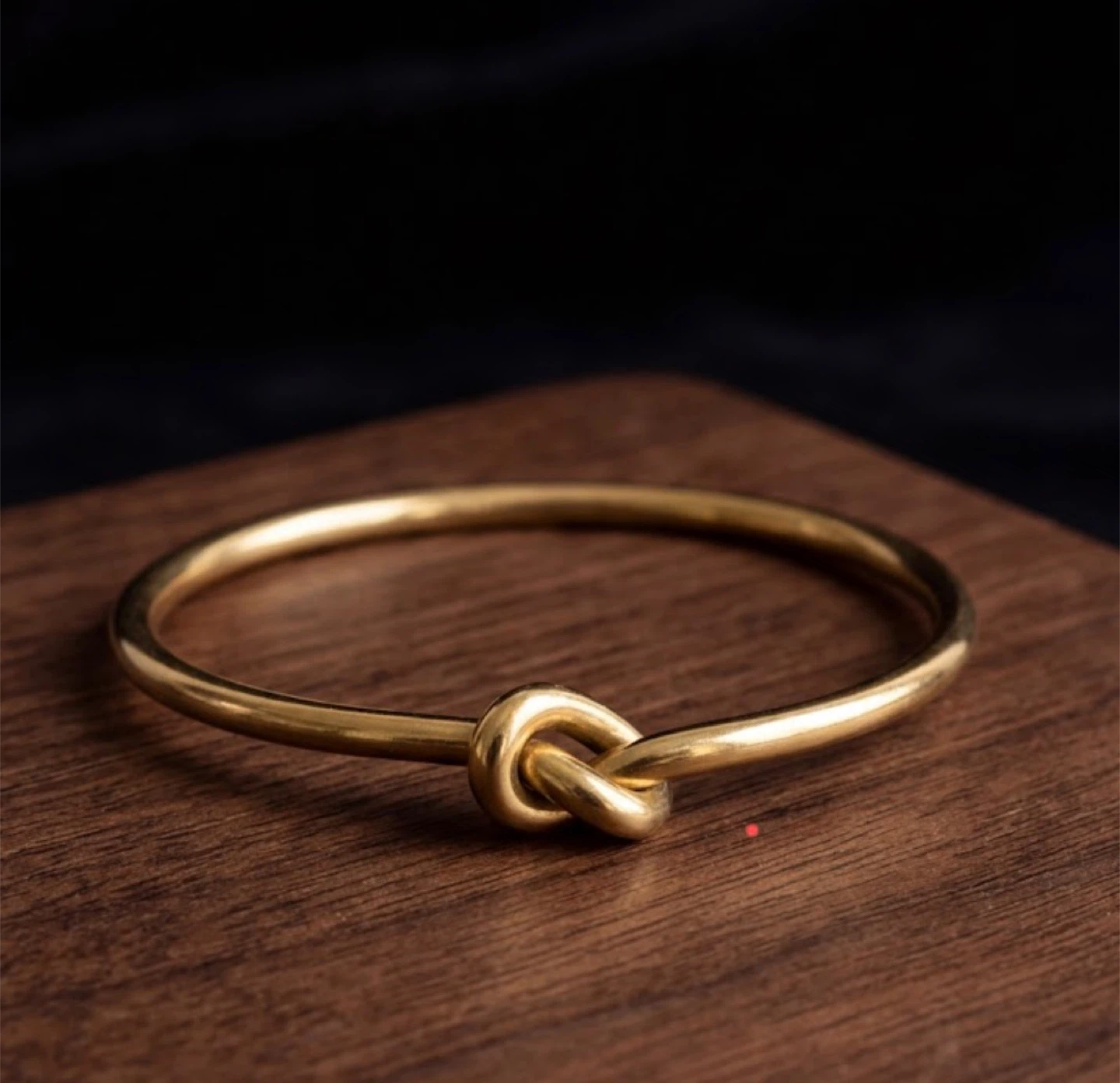 Gold Tone Knot Bangle Bracelet