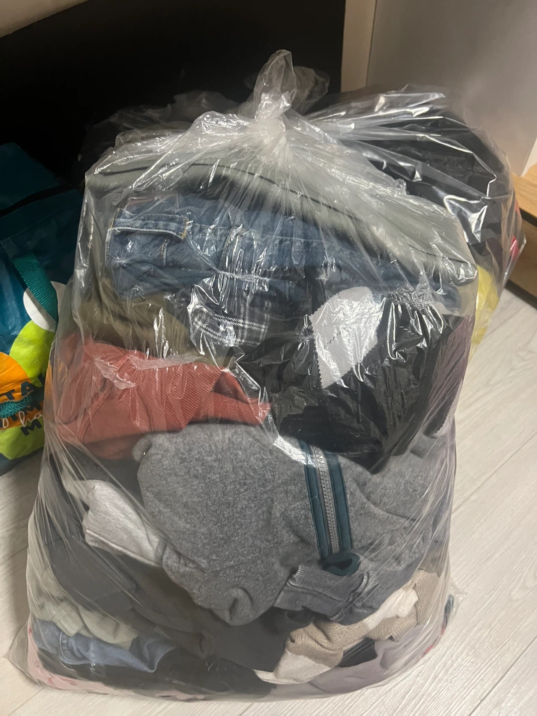 Bag of assorted clothing items - photo 3