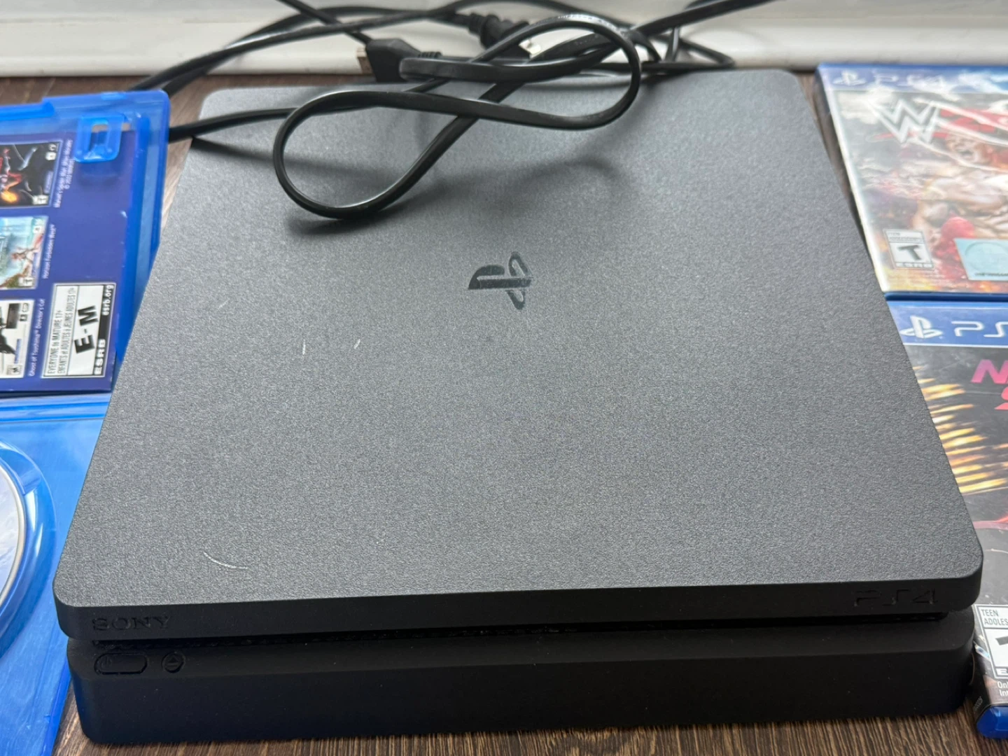 Sony PlayStation 4 Slim Console with Games and Controllers - photo 5