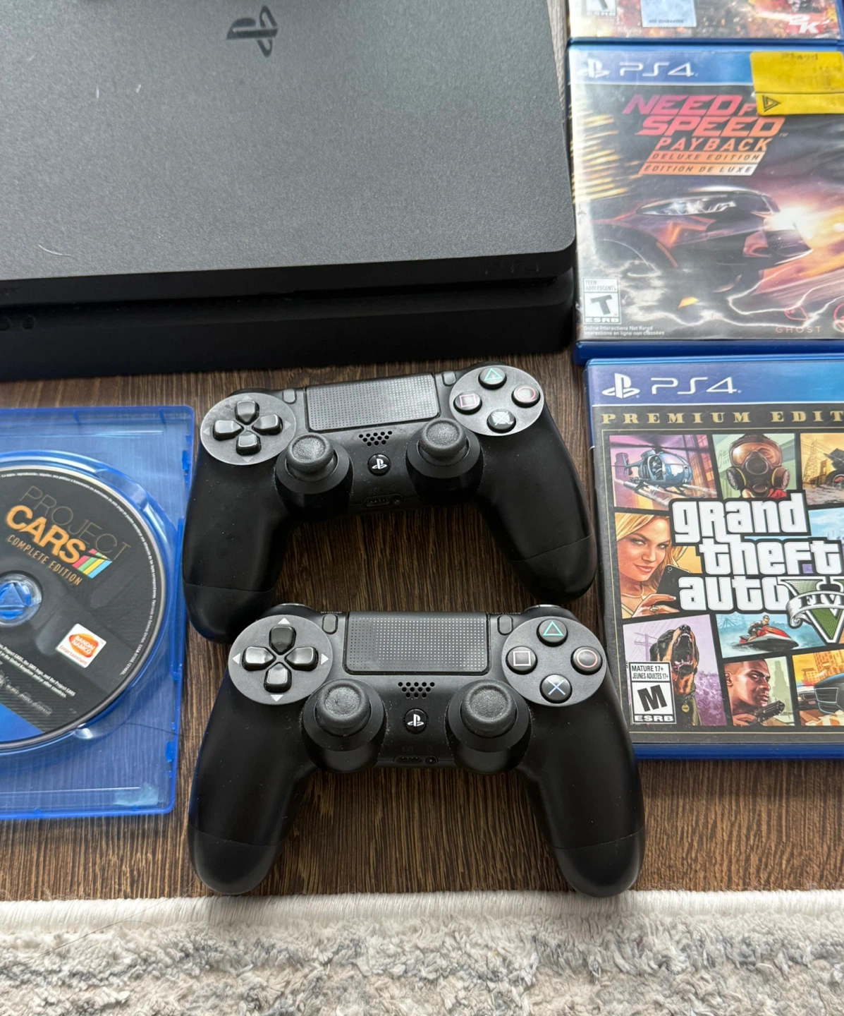 Sony PlayStation 4 Slim Console with Games and Controllers - photo 3