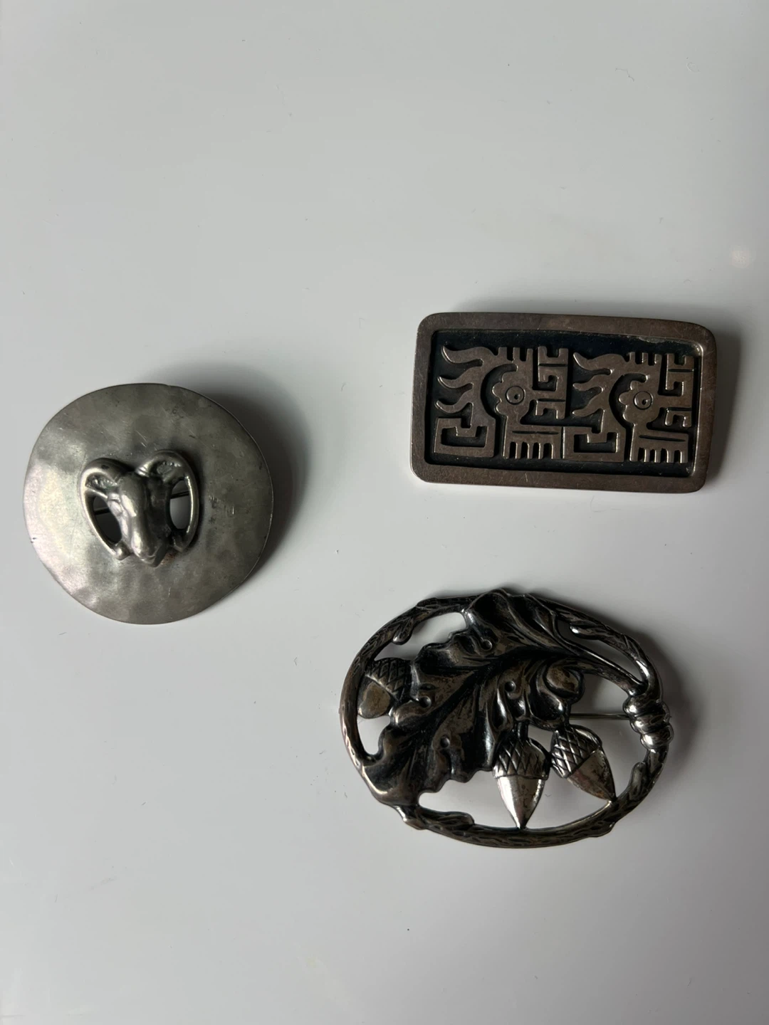 3 Silver Vintage Brooches - Ram, Acorn, and Geometric Designs