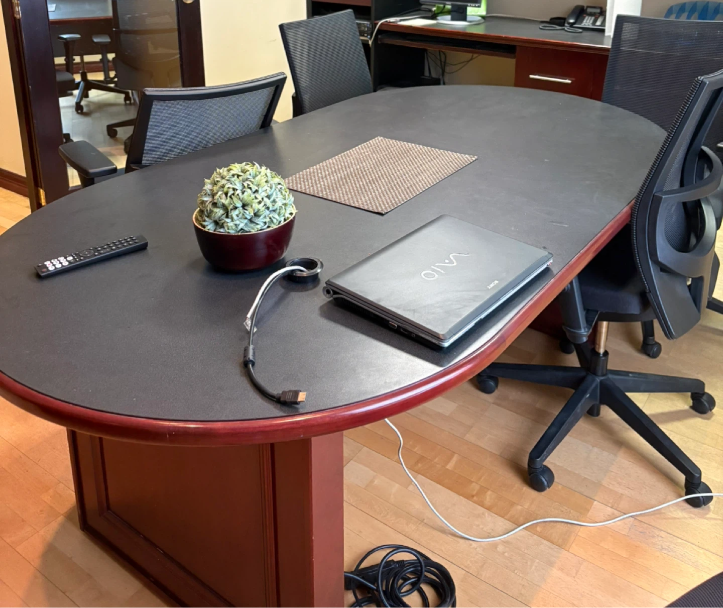 Oval Conference Table with Built-in Cabinetry