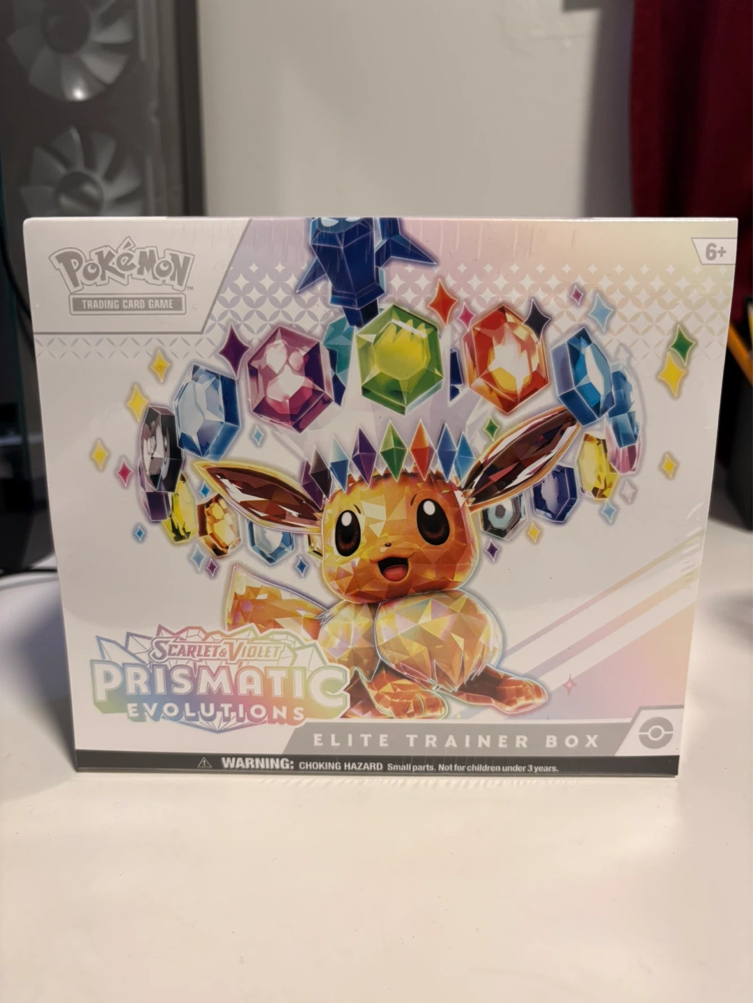 Prismatic Evolutions Elite Trainer Box. ETB has tear on side.