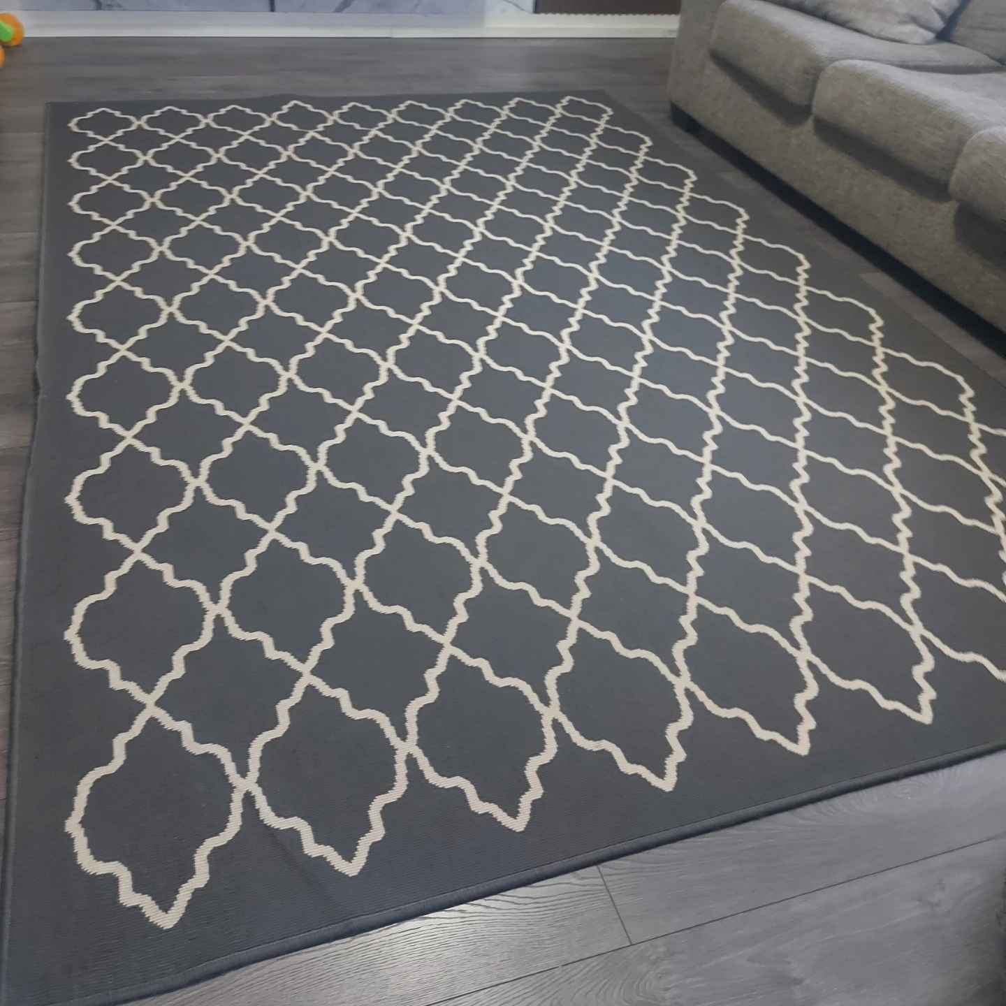 Grey and White Quatrefoil Pattern Area Rug