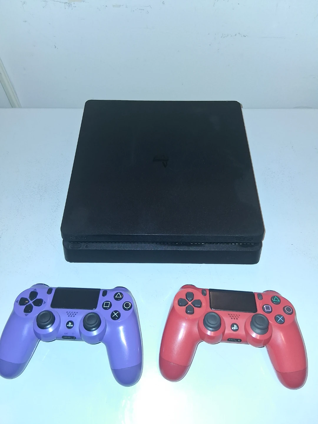 Sony PlayStation 4 Slim Console with 2 Controllers