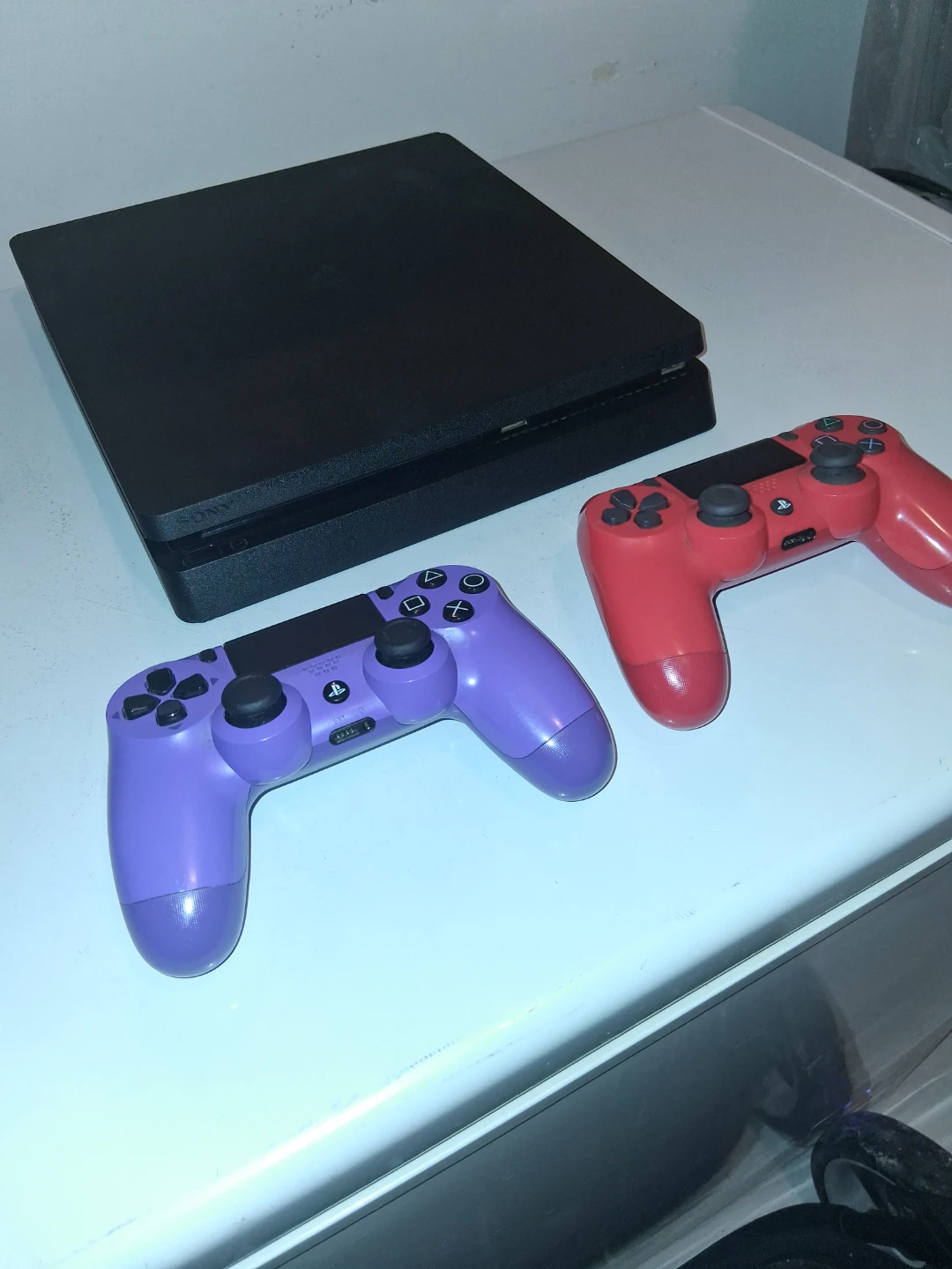 Sony PlayStation 4 Slim Console with 2 Controllers - photo 2