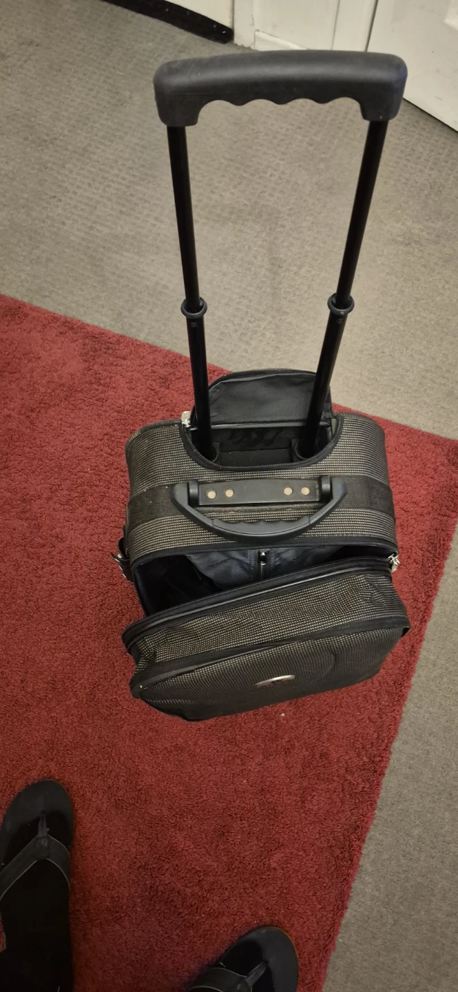 Steel King Rolling Suitcase
