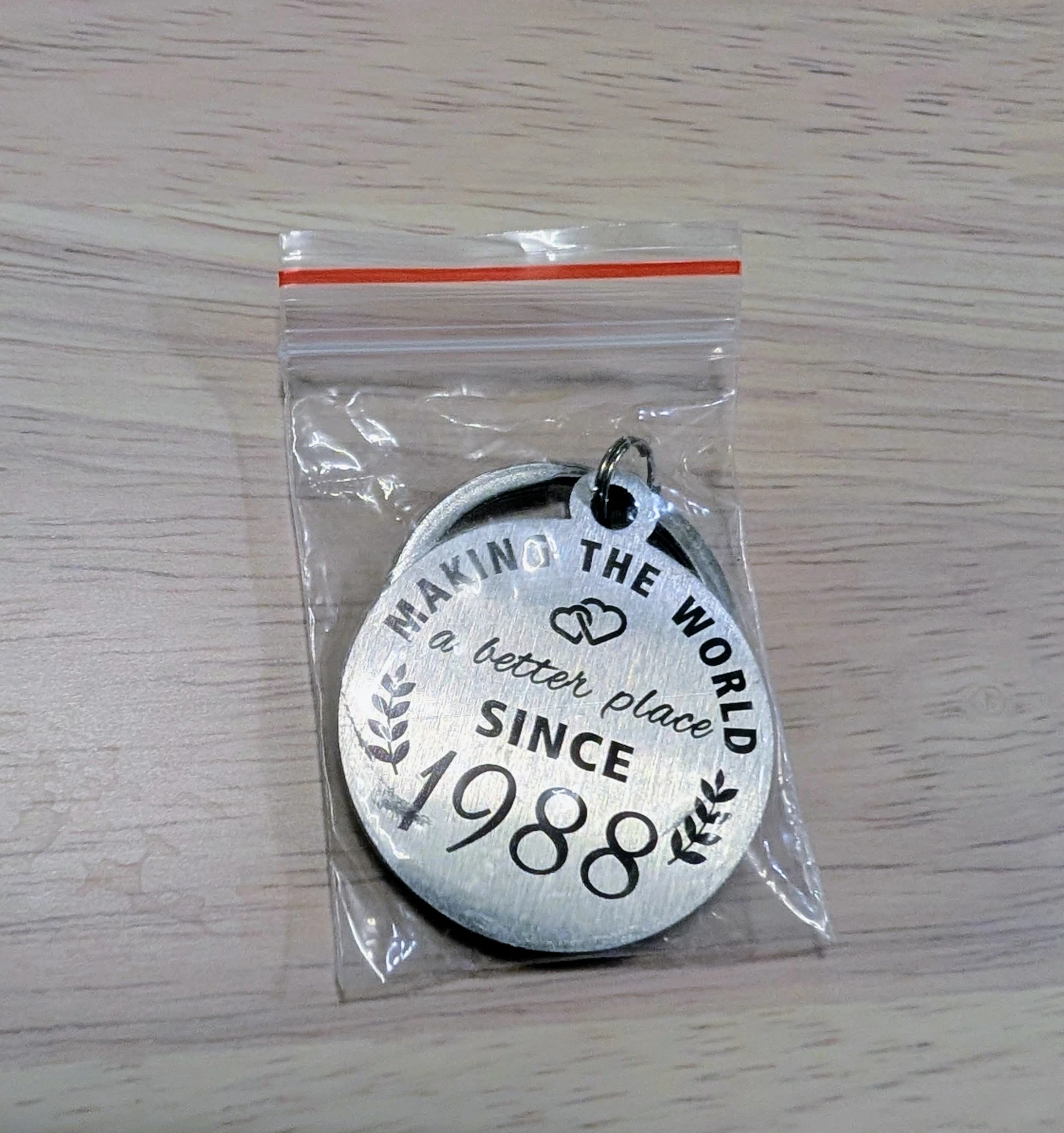 Brand New "Making the World a Better Place Since 1988" Keychain