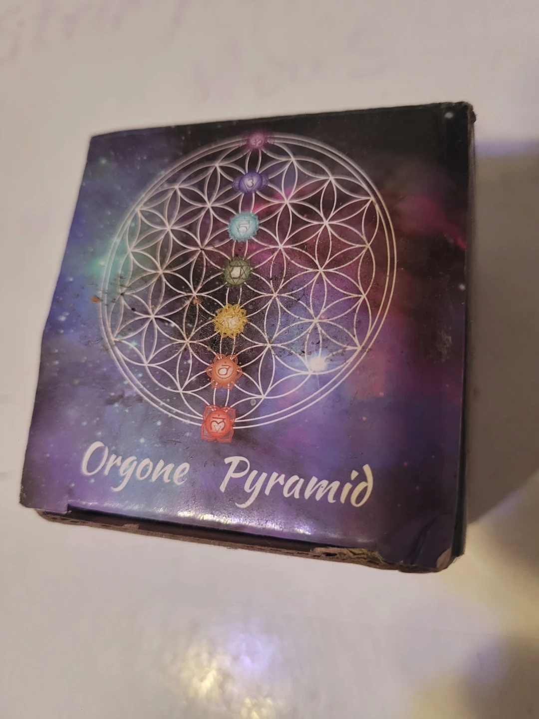 Orgone Pyramid with OM symbol and gemstones