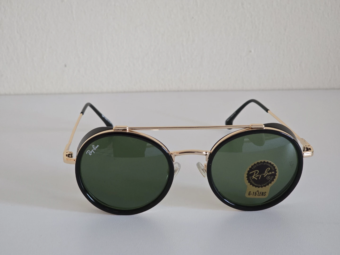 Ray-Ban Sunglasses with Black Frame and Green Lenses