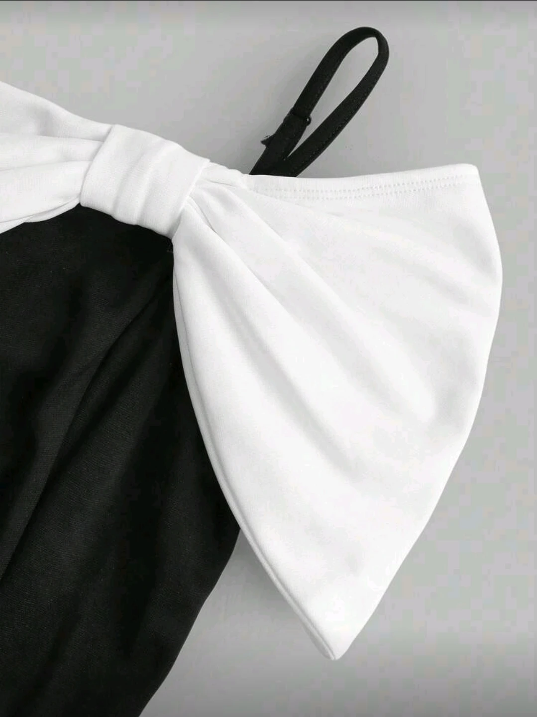 Black Off-the-Shoulder Dress with White Bow Detail