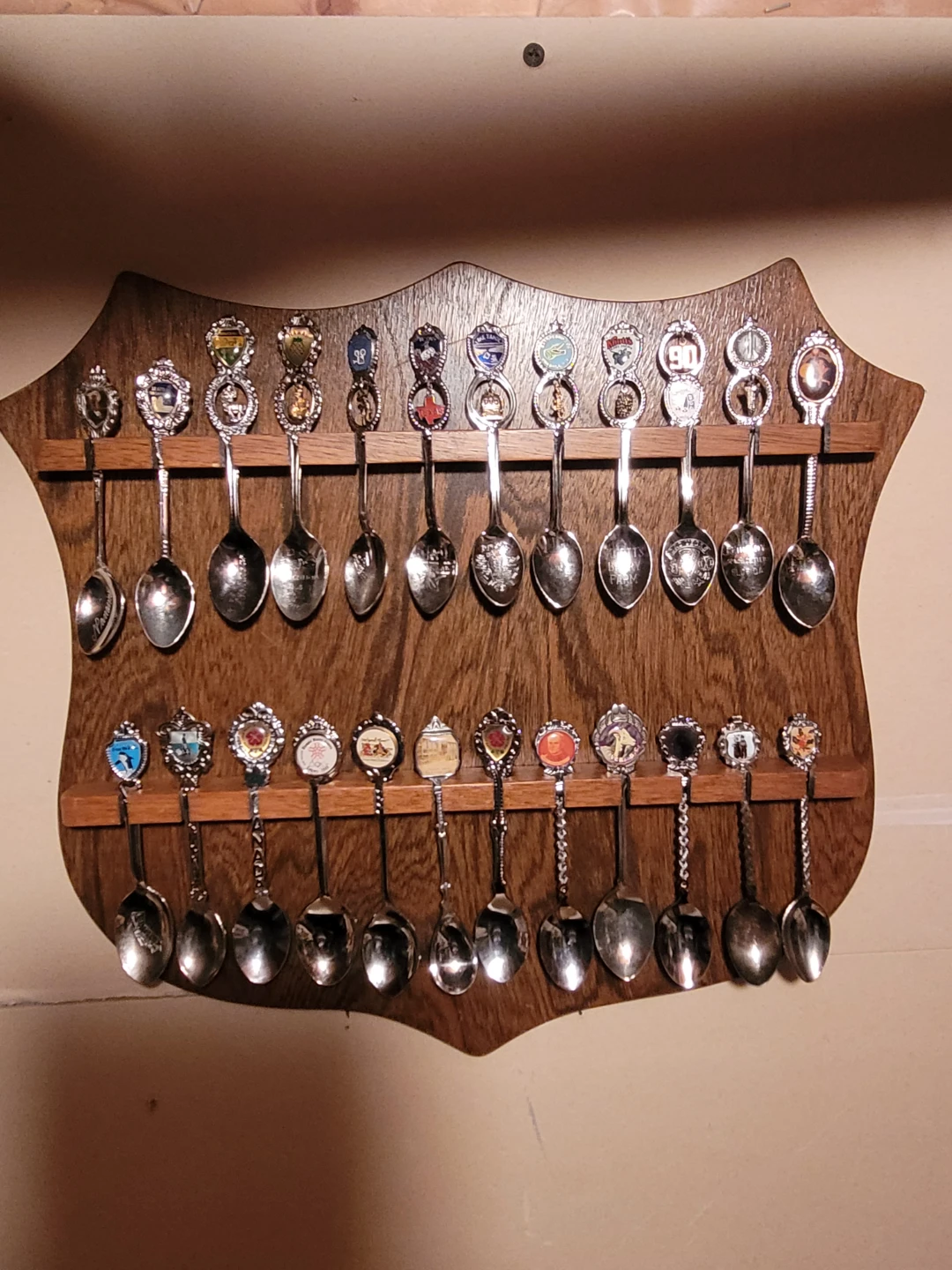 Collection of 26 Decorative Souvenir Spoons with Display Board