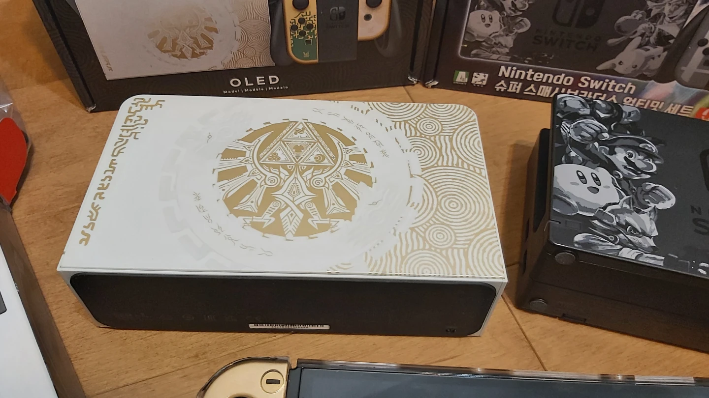 Zelda/Smash Bros OLED Nintendo Switch Bundle with Micro SD - photo 5