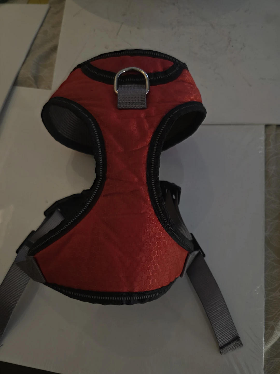 Dog harness marked "L"