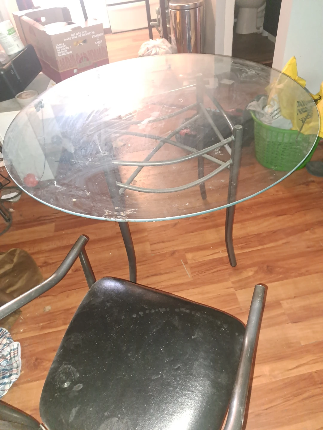 Wrought iron glass top and 4 chairs