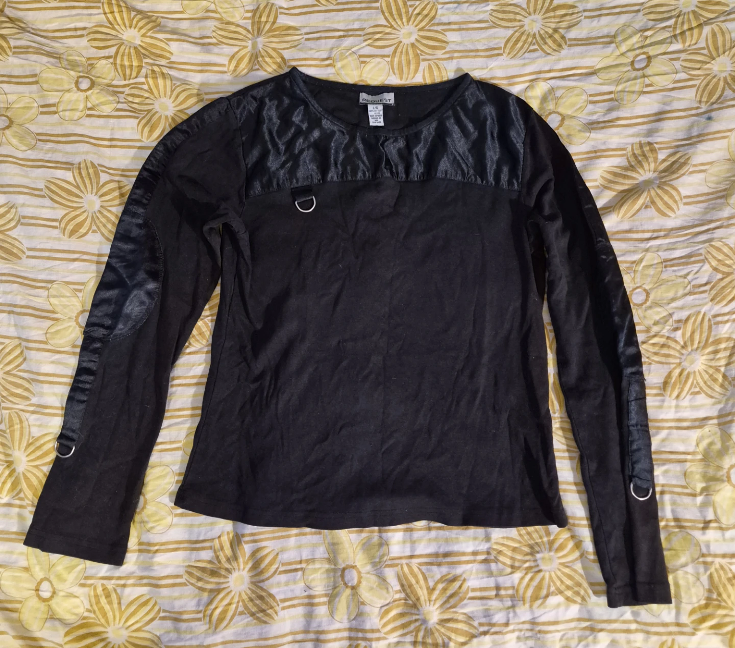 Black long sleeve top with satin details