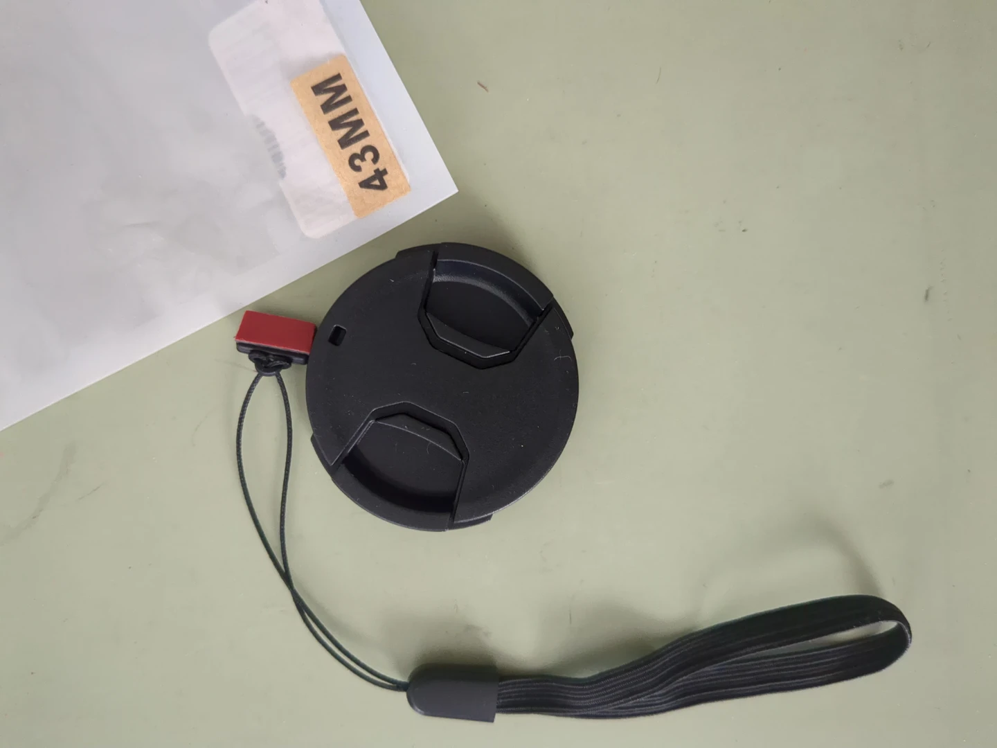 JJC 43MM Lens Cap with Strap 🥕 - photo 2