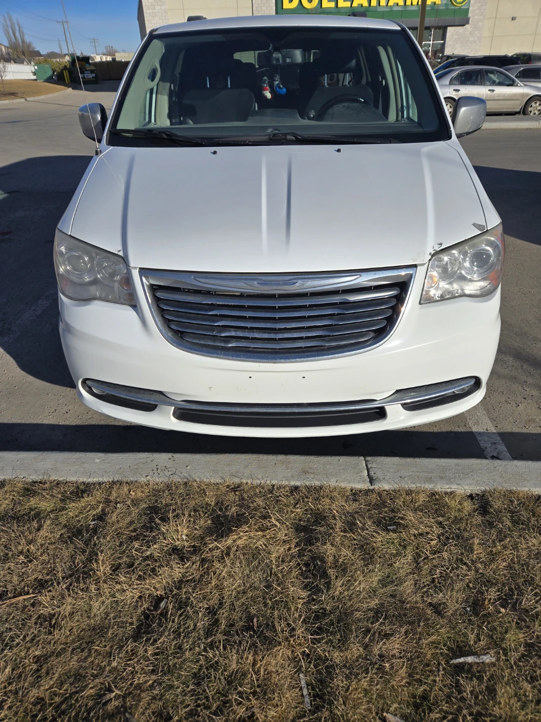 White Chrysler Town & Country Minivan