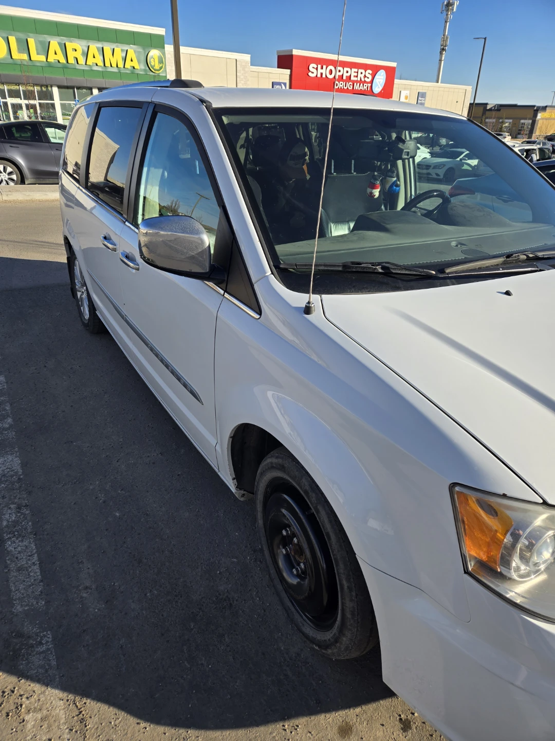 White Chrysler Town & Country Minivan - photo 2