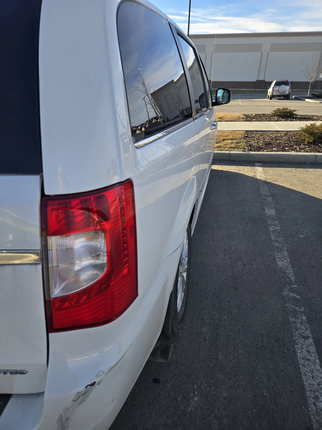 White Chrysler Town & Country Minivan - photo 4