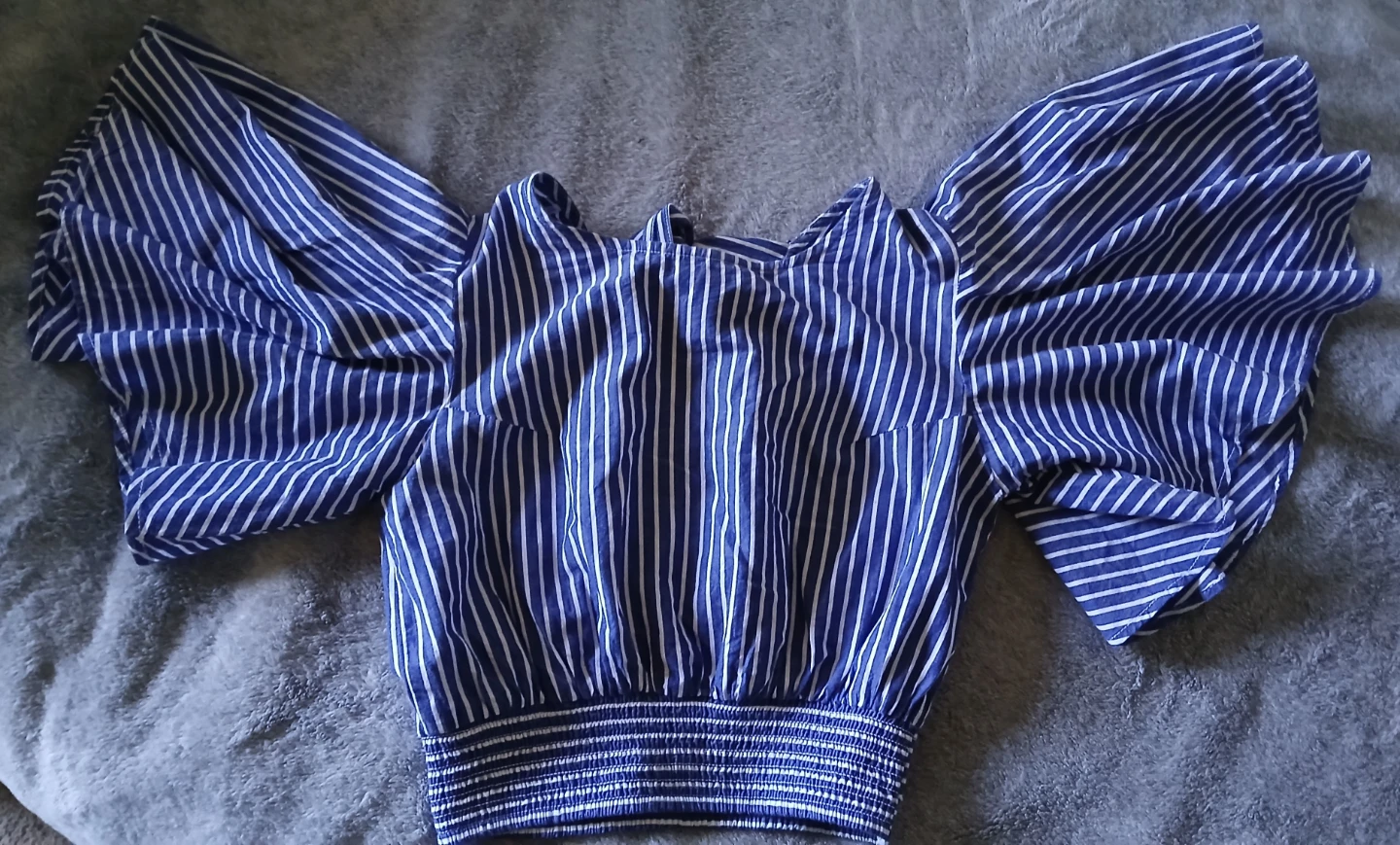 Blue and white striped off-the-shoulder top