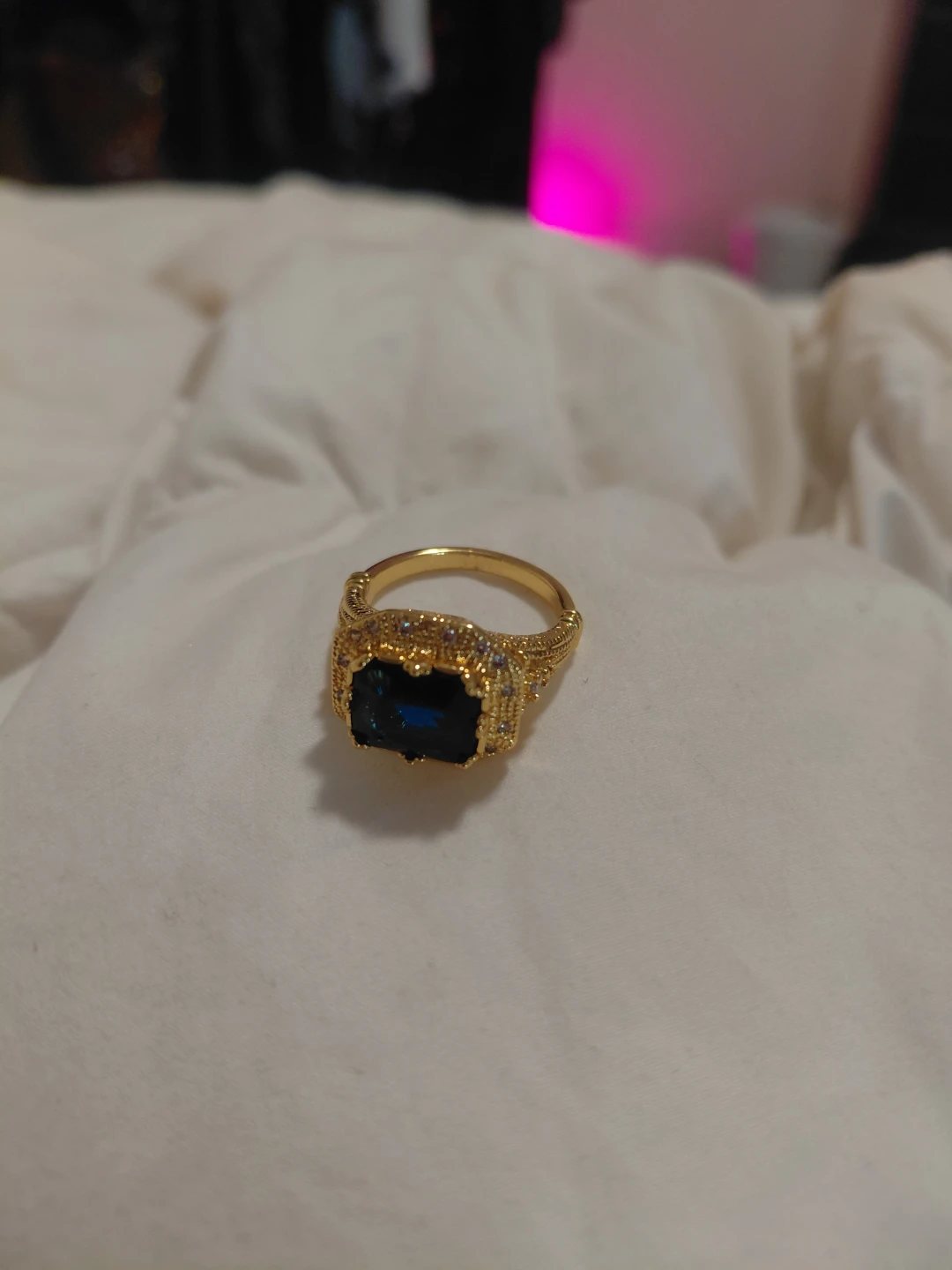 Gold-toned statement ring with dark blue stone - photo 4