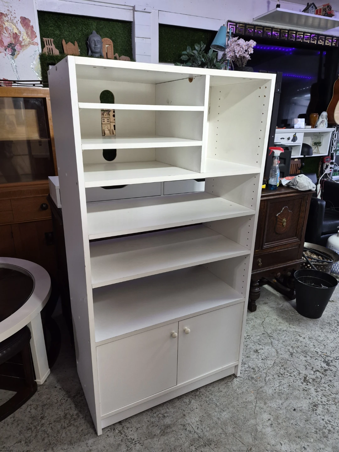White multi-shelf bookcase with cabinet