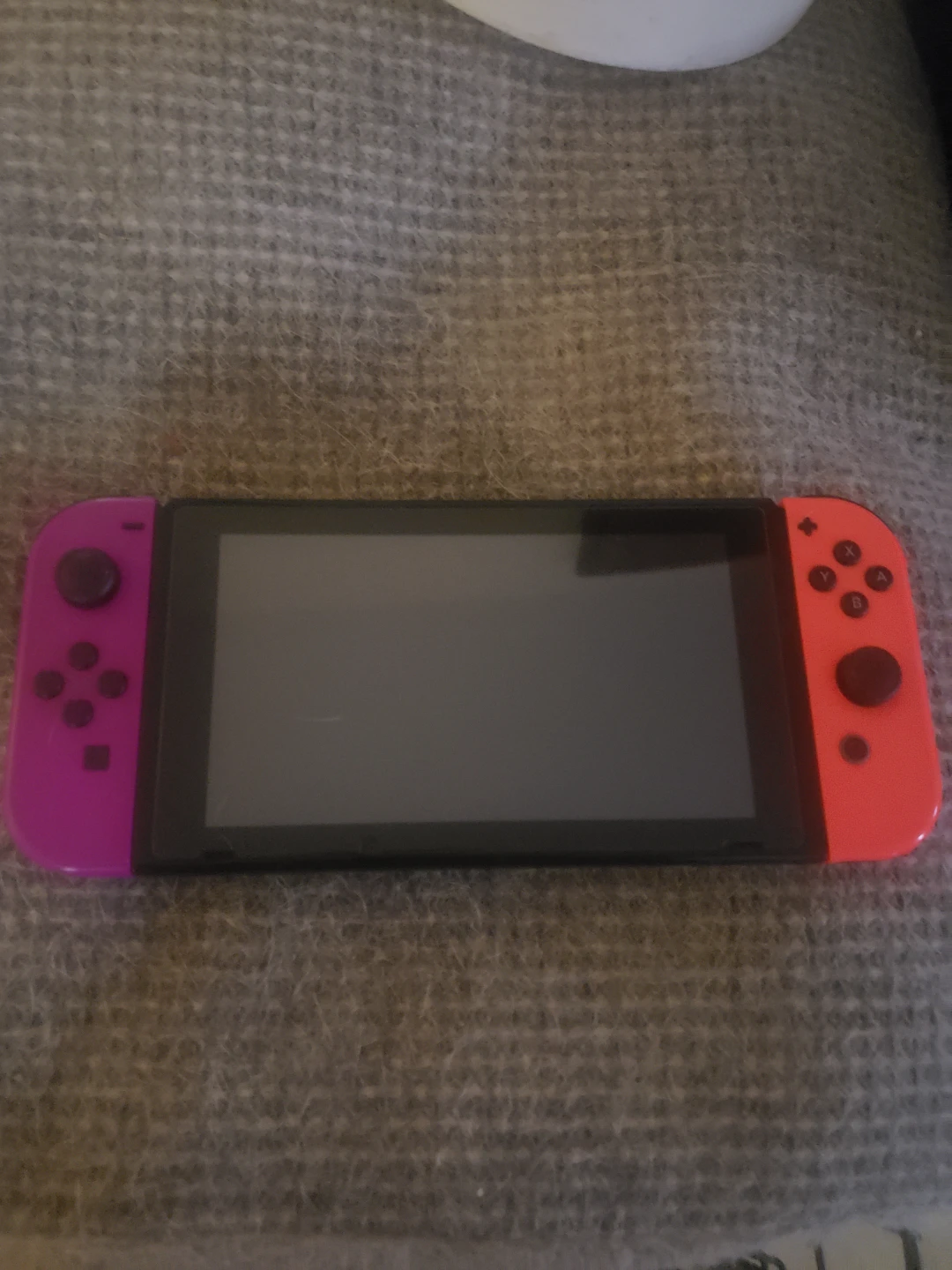 Nintendo Switch Console with Neon Pink and Orange Joy-Cons